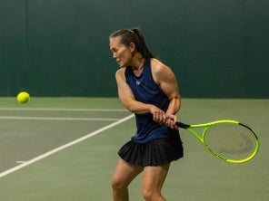 Image of a TW playtester hitting a return. 