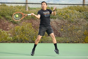 Image of a TW playtester hitting a forehand. 