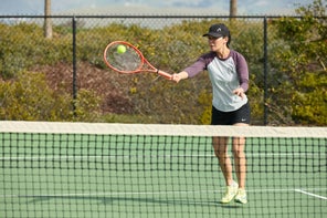 Image of a TW playtester hitting a volley. 