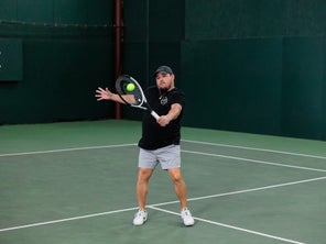 Image of a Playtester Hitting a Volley