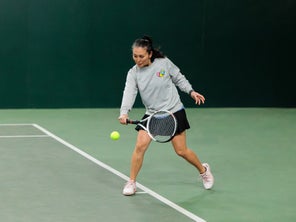Image of a Playtester Hitting a Backhand