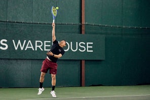 Image of a Playtester Hitting a Serve