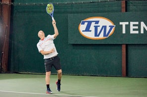 Image of a Playtester Hitting a Serve