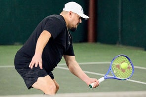 Image of a Playtester Hitting a Volley