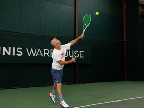 Image of a Playtester Hitting a Serve