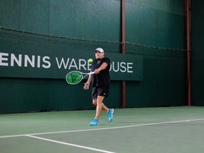 Playtester Hitting a Backhand