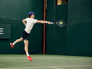 Image of Playtester Hitting a Backhand