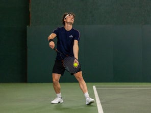 TW playtester prepping for a serve in the Hypercourt Express 3s. 