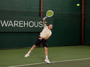 Image of a Playtester Hitting a Serve