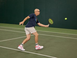 Image of a Playtester Hitting a Forehand Volley