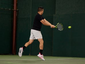 Image of a Playtester Hitting a Backhand