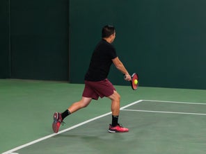 Image of a Playtester Hitting a Backhand