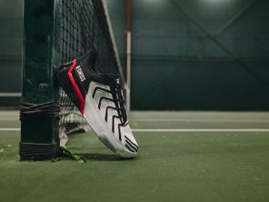 Image of a Shoe Leaning Against the Net