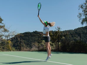 Image of a Playtester Hitting a Serve