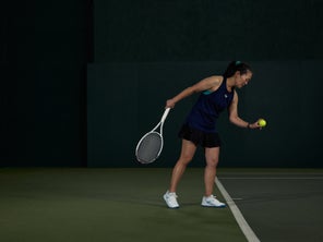 Image of a Playtester Hitting a Serve