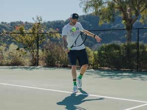Image of a Playtester Hitting a Backhand
