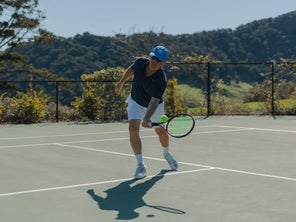 Image of a Playtester Hitting a Forehand Volley