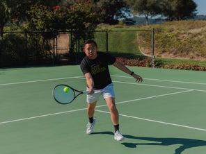 Image of a Playtester Hitting a Forehand Volley