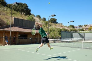 Image of a Playtester Hitting an Overhead