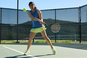Image of a TW playtester hitting a backhand. 