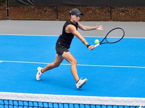 Image of a Playtester Hitting a Backhand