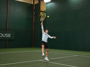 Image of a TW playtester hitting an overhead. 