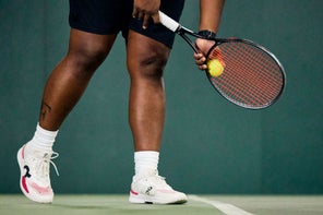 Image of a Playterter's Legs Right Before Serving