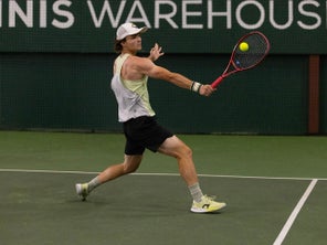 TW playtester hitting a backhand slice. 