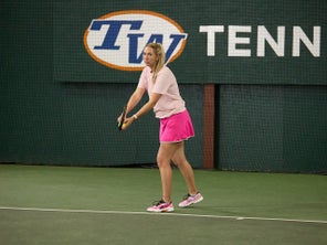 Image of a Playtester Hitting a Serve