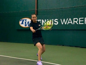 Image of Playtester Hitting a Backhand