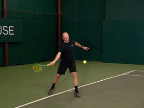 Image of a Playtester hitting a Forehand