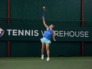 Image of a Playtester Hitting a Serve