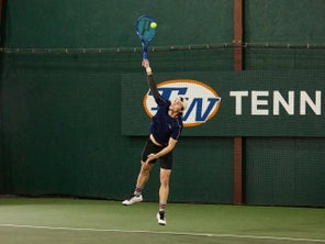 Image of a Playtester Hitting a Serve