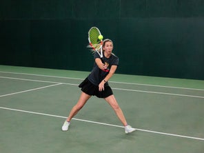 Image of a Playtester Hitting a Volley