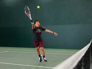 Image of a Playtester Hitting a Volley