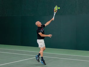 Image of a Playtester Hitting an Overhead