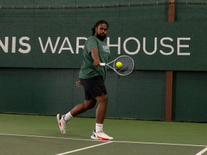 Image of a Playtester Hitting a Backhand