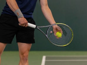 Image of a Playtester Getting ready to Hit a Serve