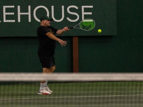 TW playtester hitting a forehand. 