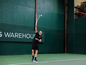 Image of a Playtester Hitting a Serve