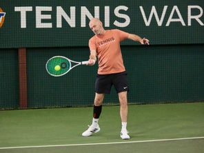 Image of a TW playtester hitting a return. 