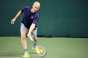Image of a TW playtester hitting a half-volley. 