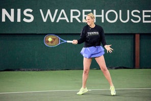 Image of a TW playtester hitting a forehand. 