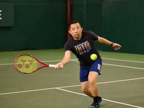 Image of a Playtester Hitting a Volley