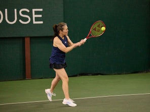 Image of a Tennis Player Hitting a Backhand