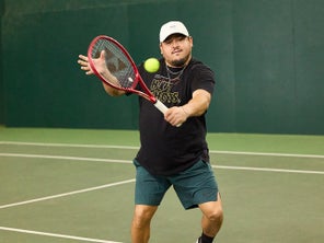 Image of a Playtester Hitting a Volley