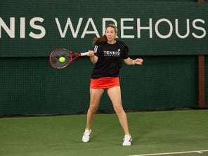 Image of a TW playtester hitting a return. 