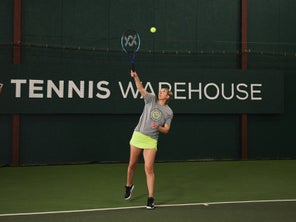 Image of a Playtester Hitting a Serve