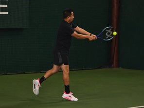Image of a Playtester Hitting a Backhand