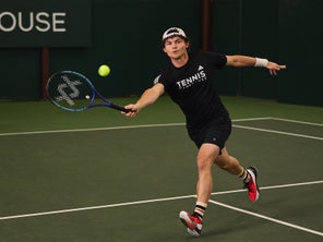 Image of a Playtester Hitting a Volley